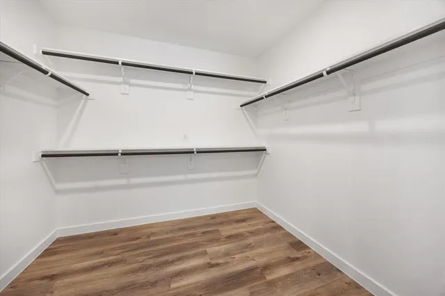 a view of an empty walk in closet