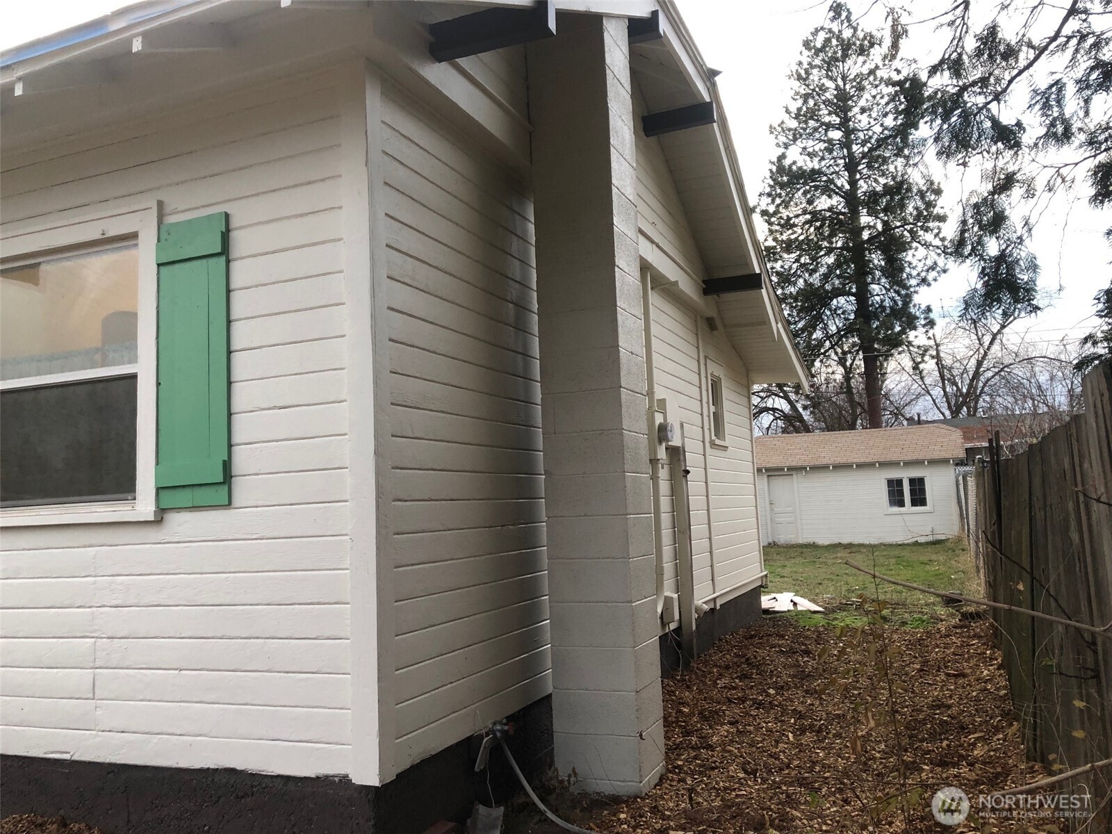 5703 North Wall Street Spokane, WA 99205 - Photo 23 of 23 a view of a house with a yard