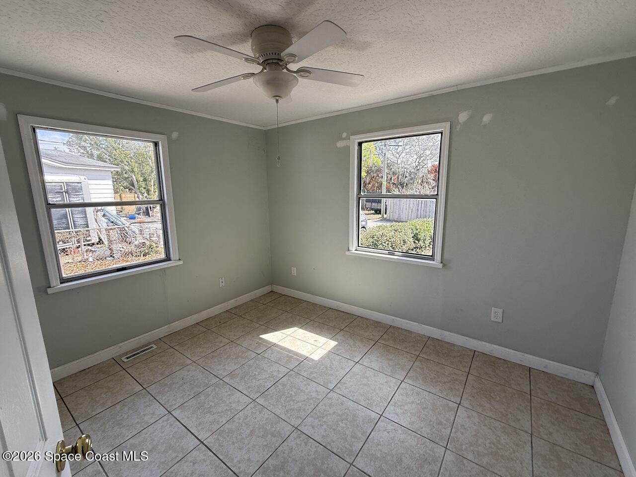 1666 Terrace Street Cocoa, FL 32922 - Photo 7 of 12 a view of an empty room and window