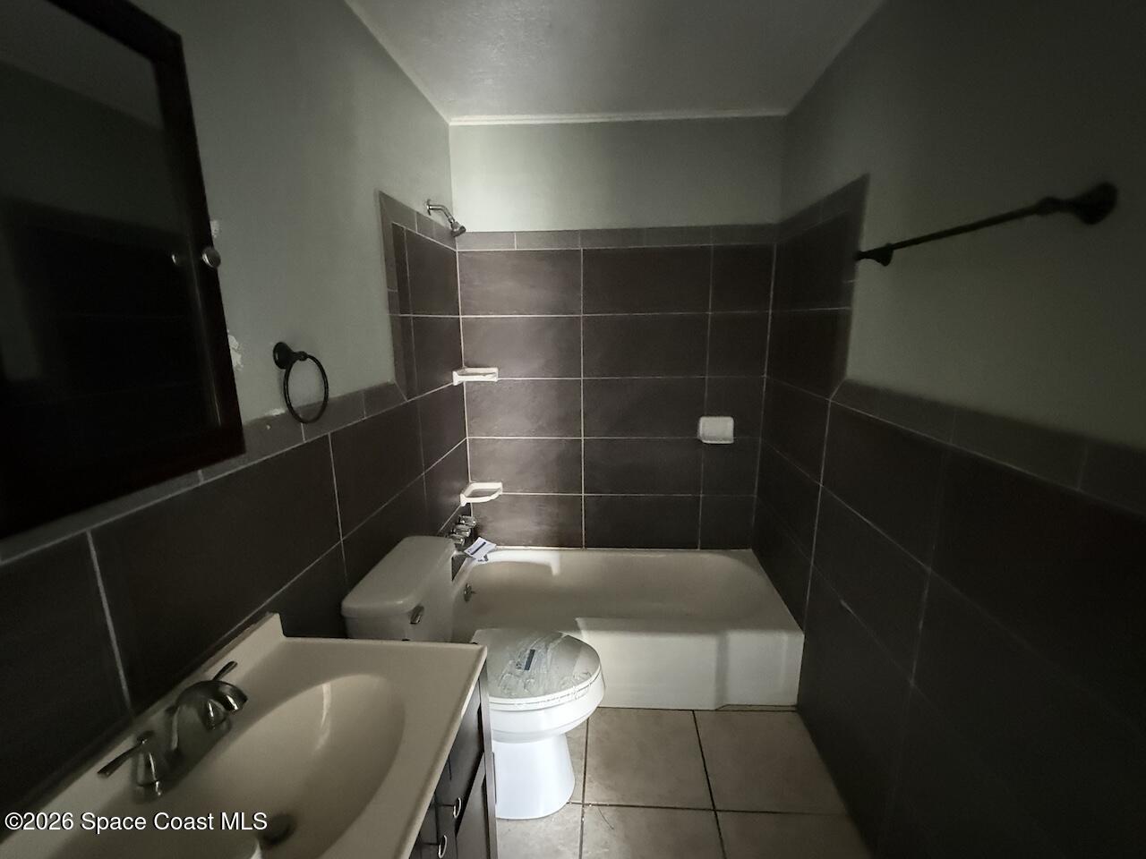 1666 Terrace Street Cocoa, FL 32922 - Photo 8 of 12 a bathroom with a bathtub