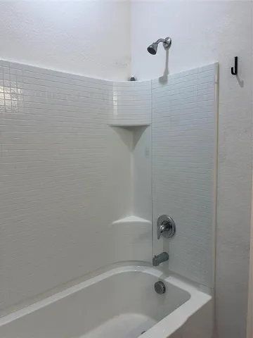 a bathroom with a bathtub