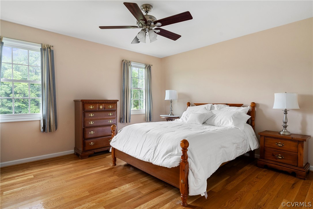 13514 Old Stage Road Hopewell, VA 23860 - Photo 21 of 42 a bedroom with a bed and a table
