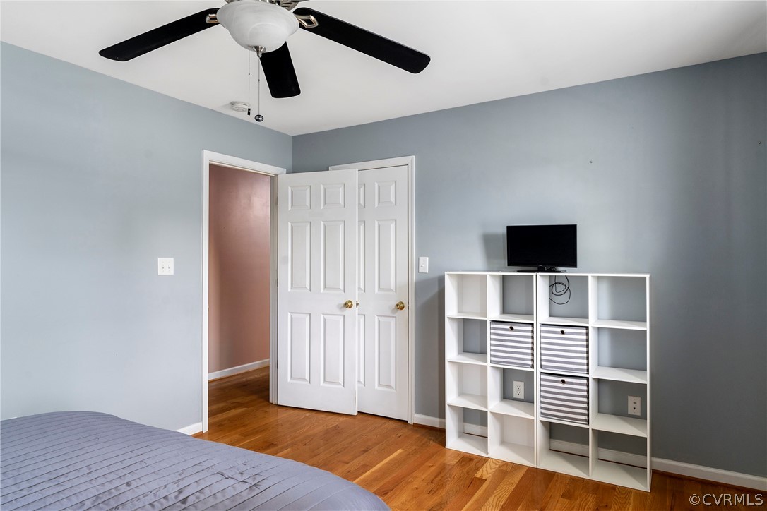 13514 Old Stage Road Hopewell, VA 23860 - Photo 29 of 42 a view of empty room with wooden floor and ceiling fan