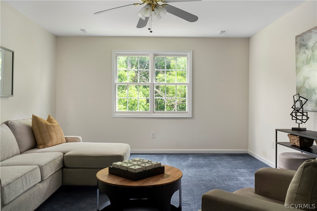 13514 Old Stage Road Hopewell, VA 23860 - Photo 32 of 42 a living room with furniture and a window