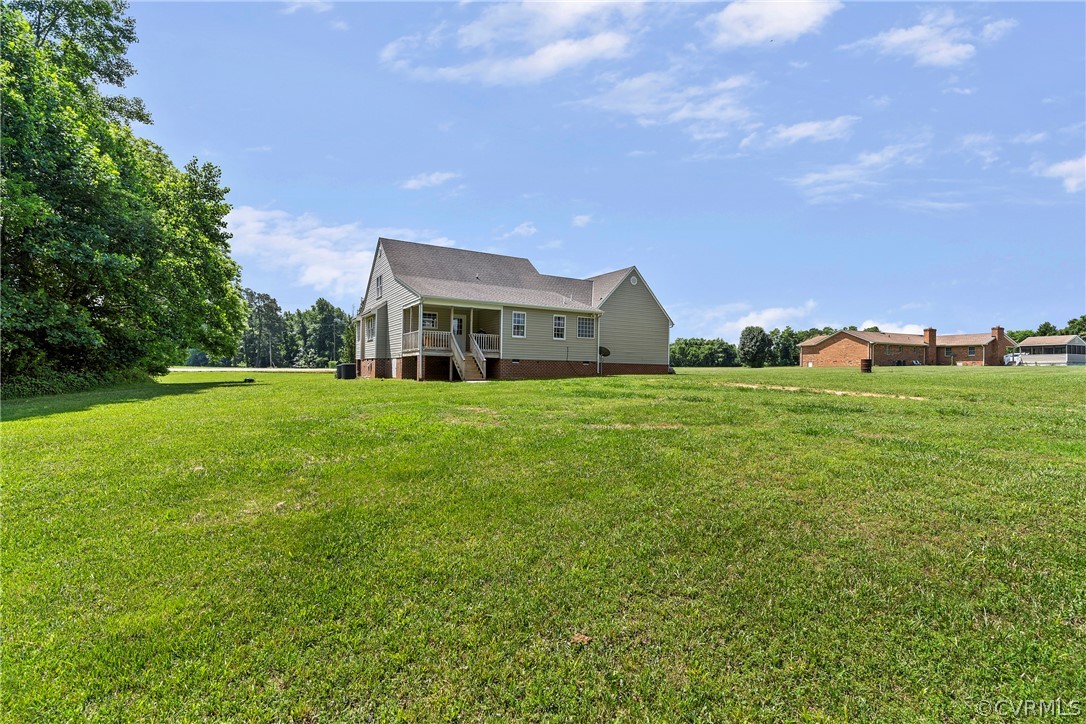 13514 Old Stage Road Hopewell, VA 23860 - Photo 41 of 42 a view of a house with a big yard