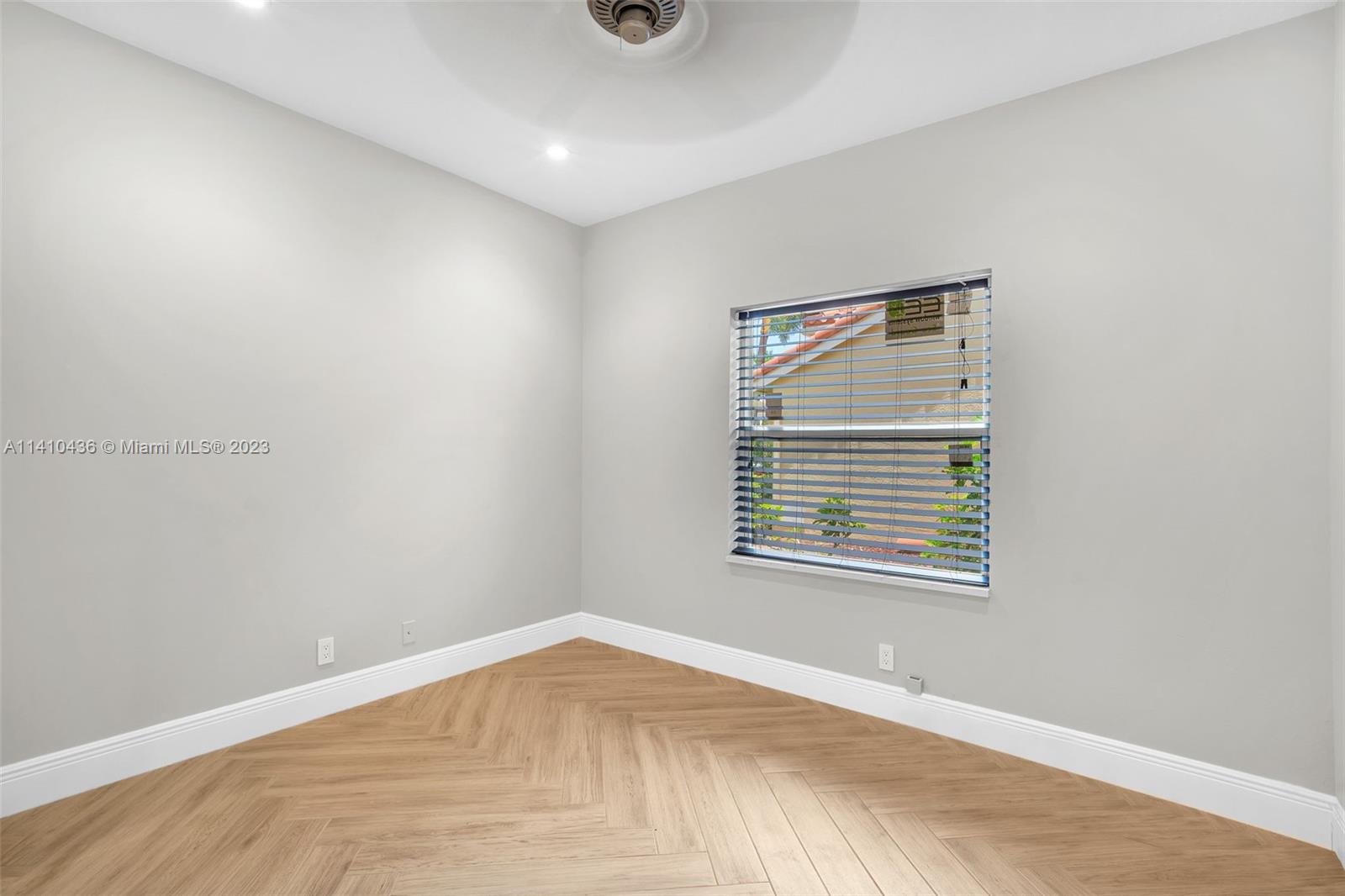 19440 Preserve Drive Boca Raton, FL 33498 - Photo 29 of 69 an empty room with a window