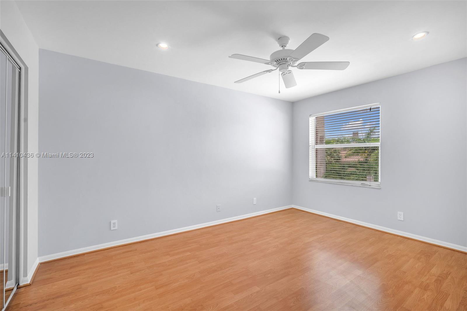 19440 Preserve Drive Boca Raton, FL 33498 - Photo 45 of 69 a view of an empty room with a window
