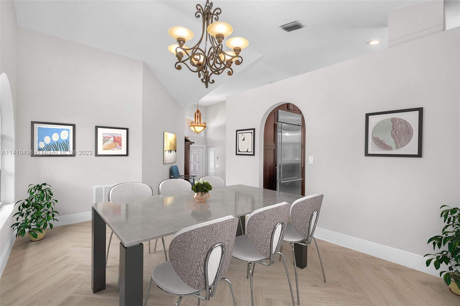 19440 Preserve Drive Boca Raton, FL 33498 - Photo 6 of 69 a dining room with furniture and chandelier
