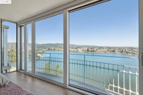 a view of a balcony with city view