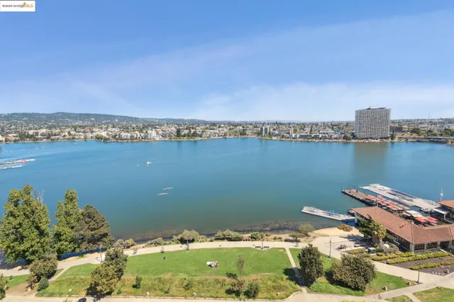 a view of a lake with a city