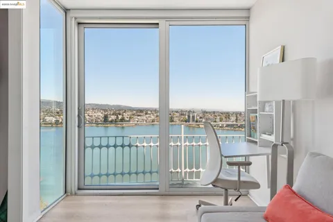 a view of a balcony with chair and table