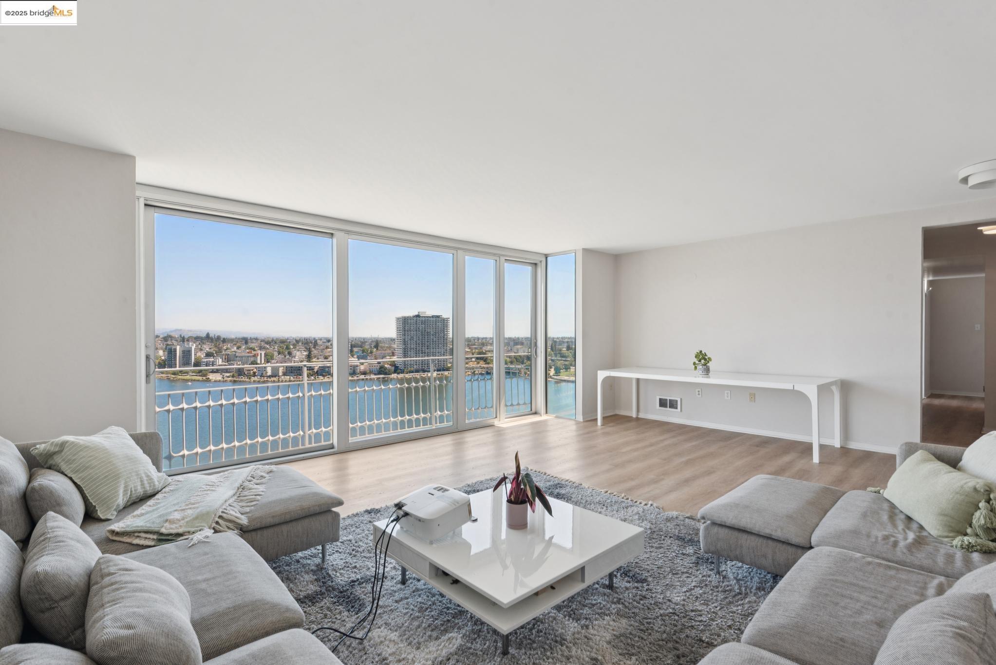 1555 Lakeside Drive, Unit 190 Oakland, CA 94612 - Photo 7 of 45 a living room with furniture and a table