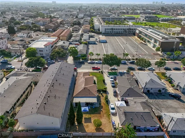 an aerial view of a city with lots of residential buildings