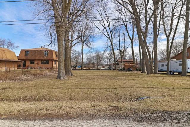 a view of road with trees
