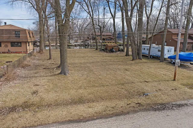 a view of a yard covered with tall buildings