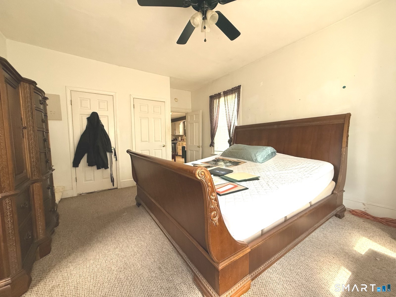 29 Florence Street Putnam, CT 06260 - Photo 12 of 17 a bed room with a bed and a couch