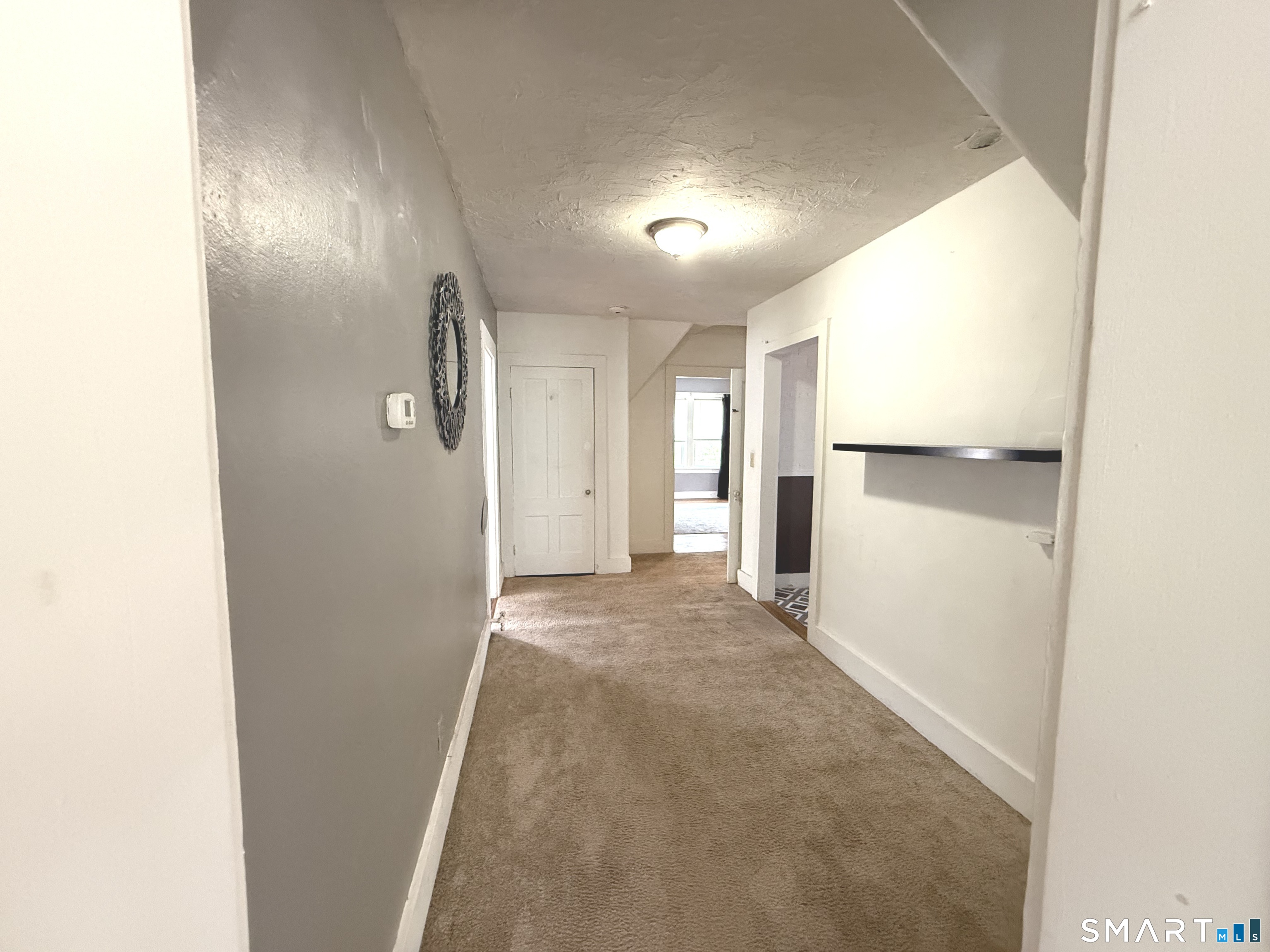 29 Florence Street Putnam, CT 06260 - Photo 10 of 17 a view of entryway with wooden floor