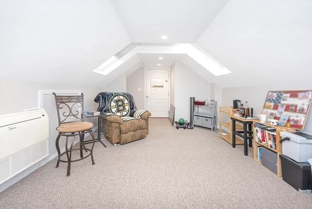 a view of deck with furniture and trees