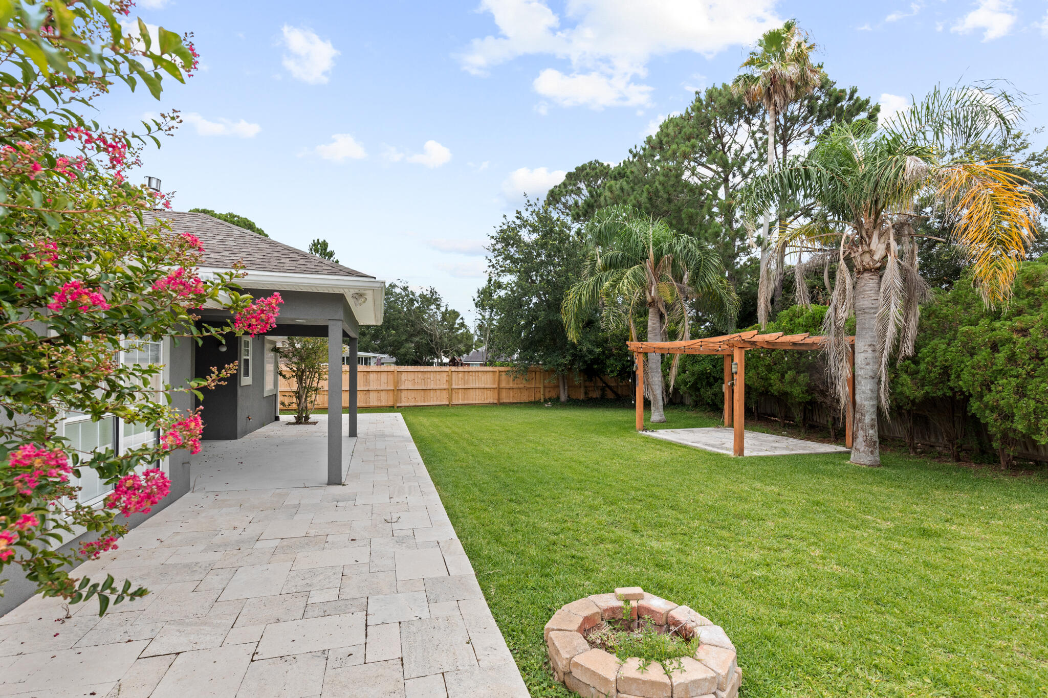 378 Sonora Road Destin, FL 32541 - Photo 4 of 30 a view of a backyard with garden