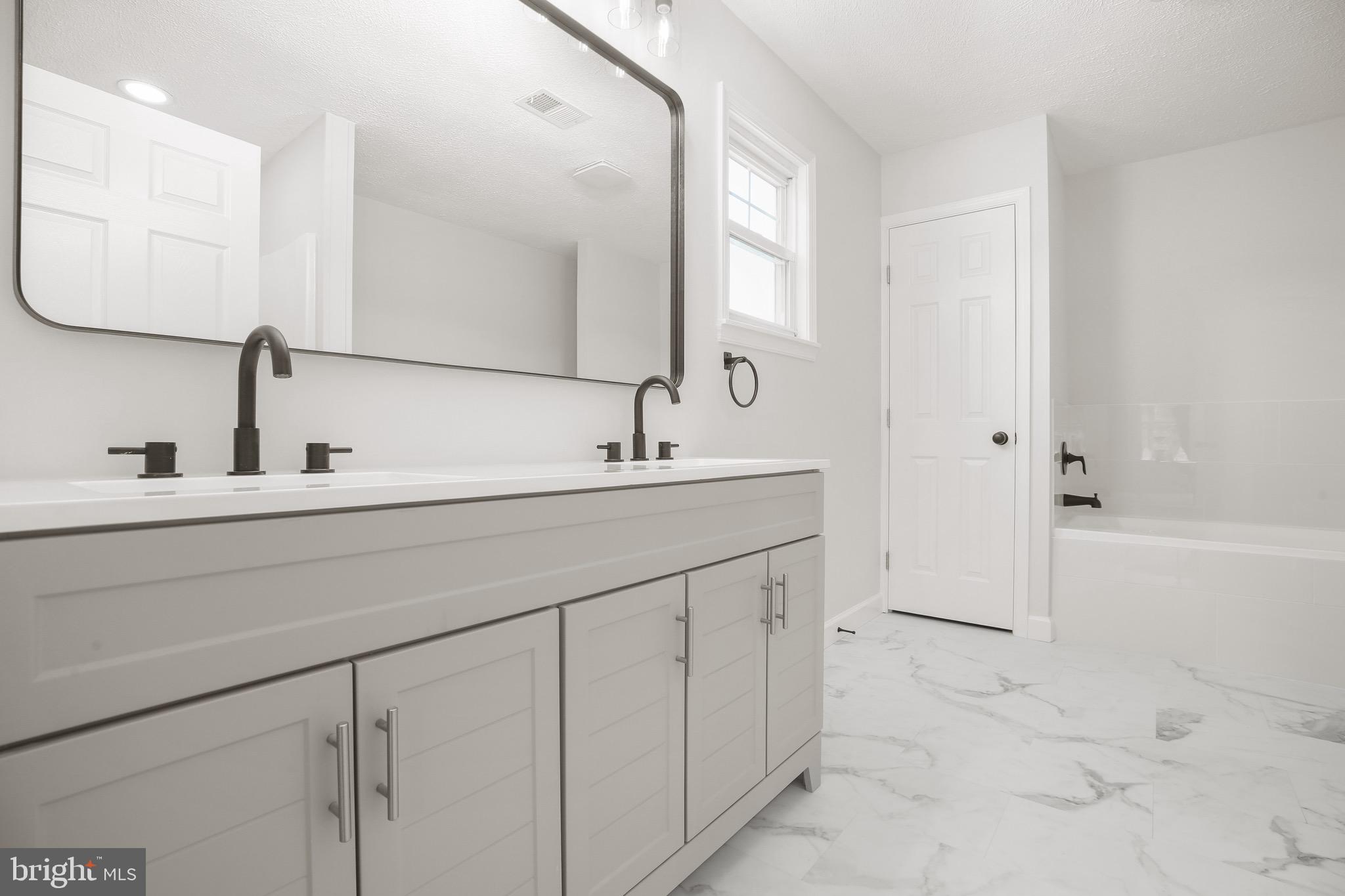 12469 Paige Road Woodford, VA 22580 - Photo 24 of 55 Main House Bathroom 1