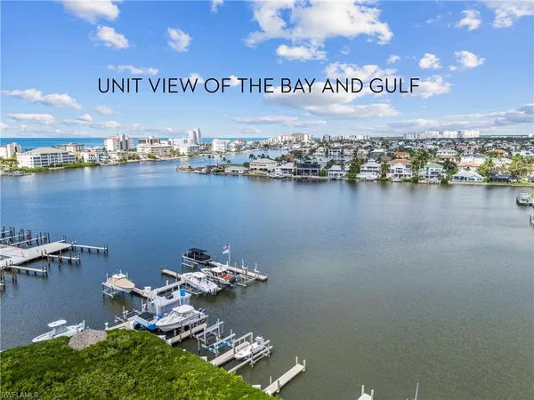 a view of a water with an outdoor seating