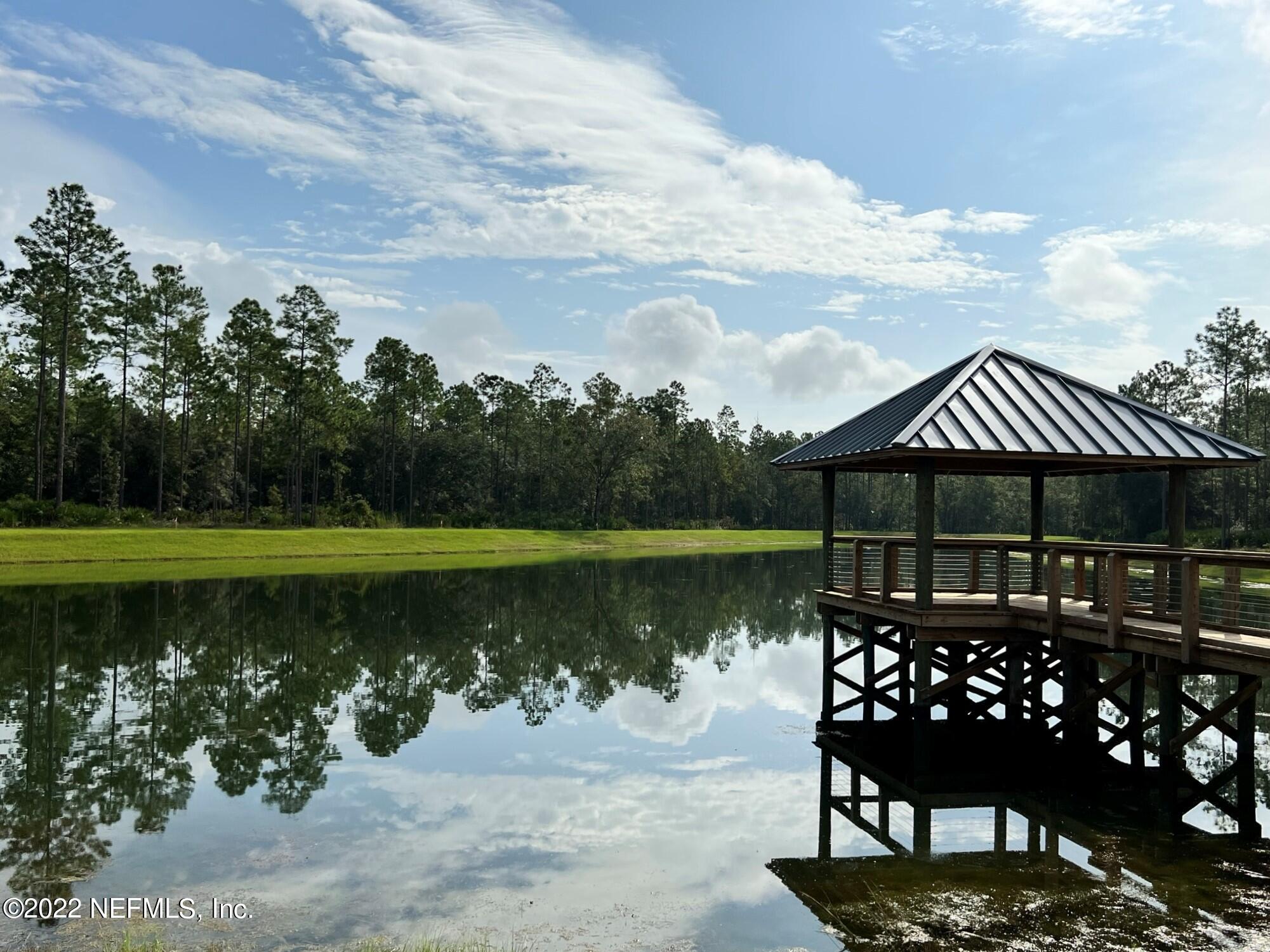 116 Fly Line Drive St. Johns, FL 32259 - Photo 51 of 51 a view of a wooden deck with lake view