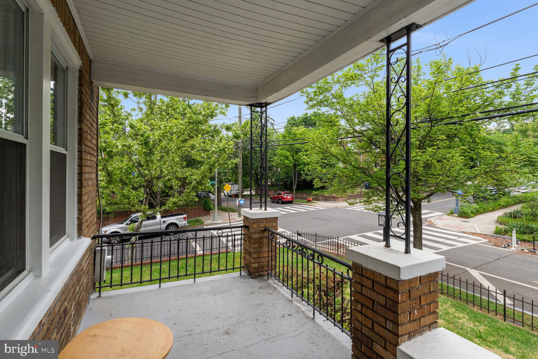 4528 4th Street Northwest Washington, DC 20011 - Photo 3 of 28 a view of a patio with a table chairs and a backyard