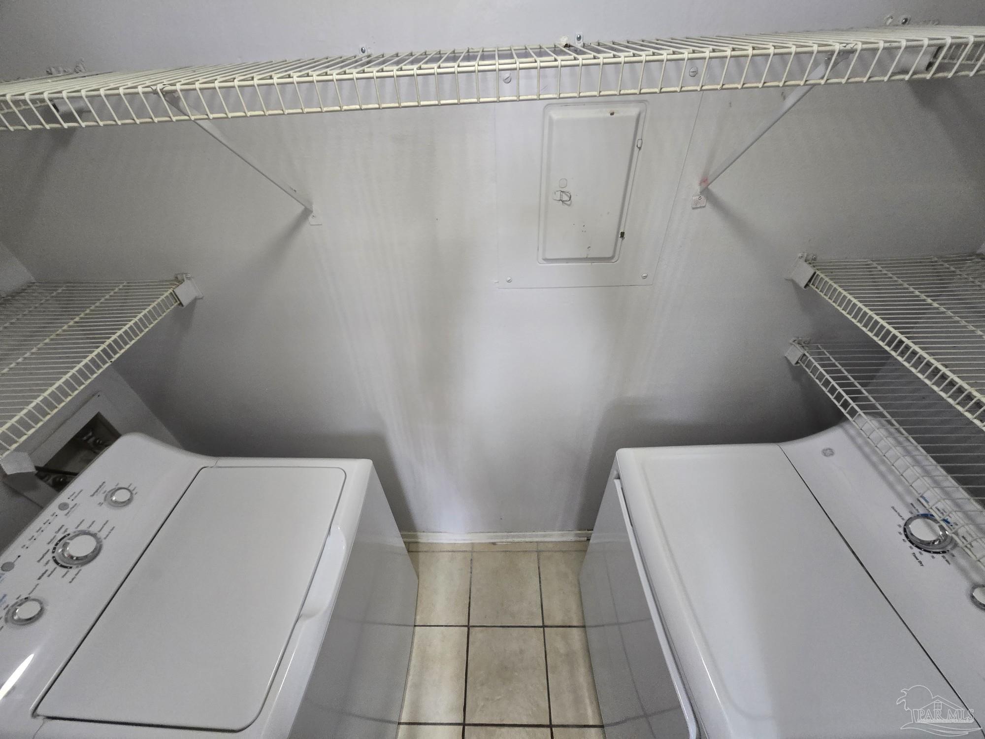 2303 West Michigan Avenue, Unit B10 Pensacola, FL 32526 - Photo 2 of 25 a utility room with dryer and washer