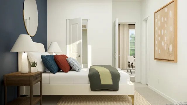 a bedroom with bed and a window