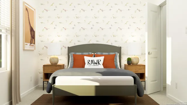 a bedroom with a bed and mirror