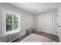 78 Main Street Tappan, NY 10983 - Photo 14 of 25 a living room with furniture and a window