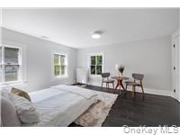 78 Main Street Tappan, NY 10983 - Photo 16 of 25 a living room with furniture and a table