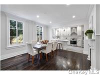 78 Main Street Tappan, NY 10983 - Photo 8 of 25 a living room with furniture and a wooden floor