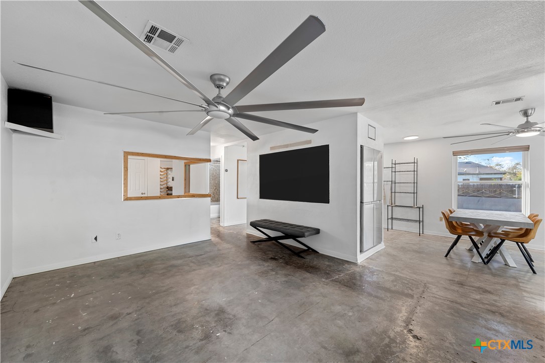 1101 East Walnut Street Waco, TX 76704 - Photo 7 of 17 a view of a livingroom with a flat screen tv