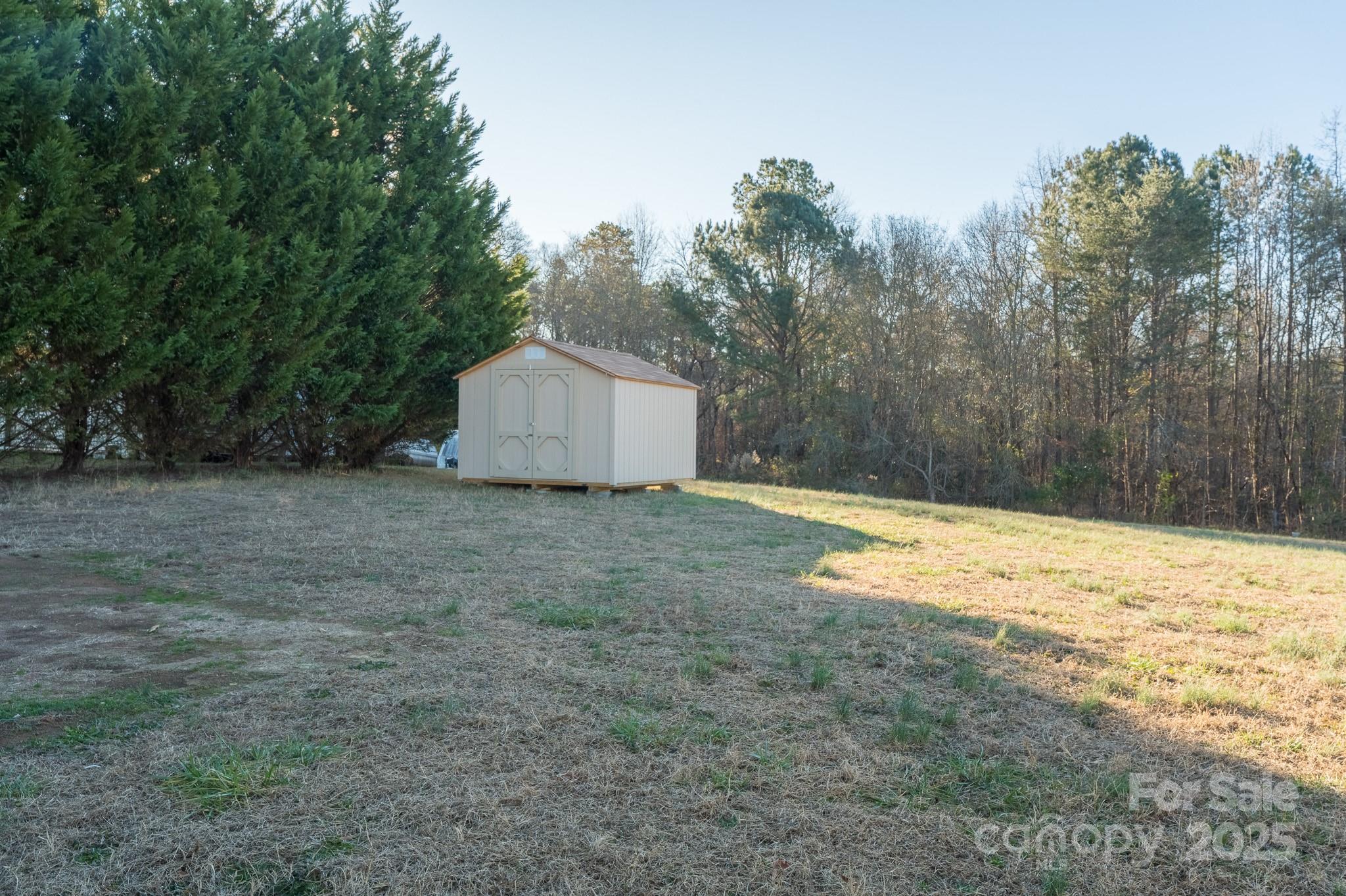 964 Lavender Road Grover, NC 28073 - Photo 24 of 26 a view of a dry yard with trees