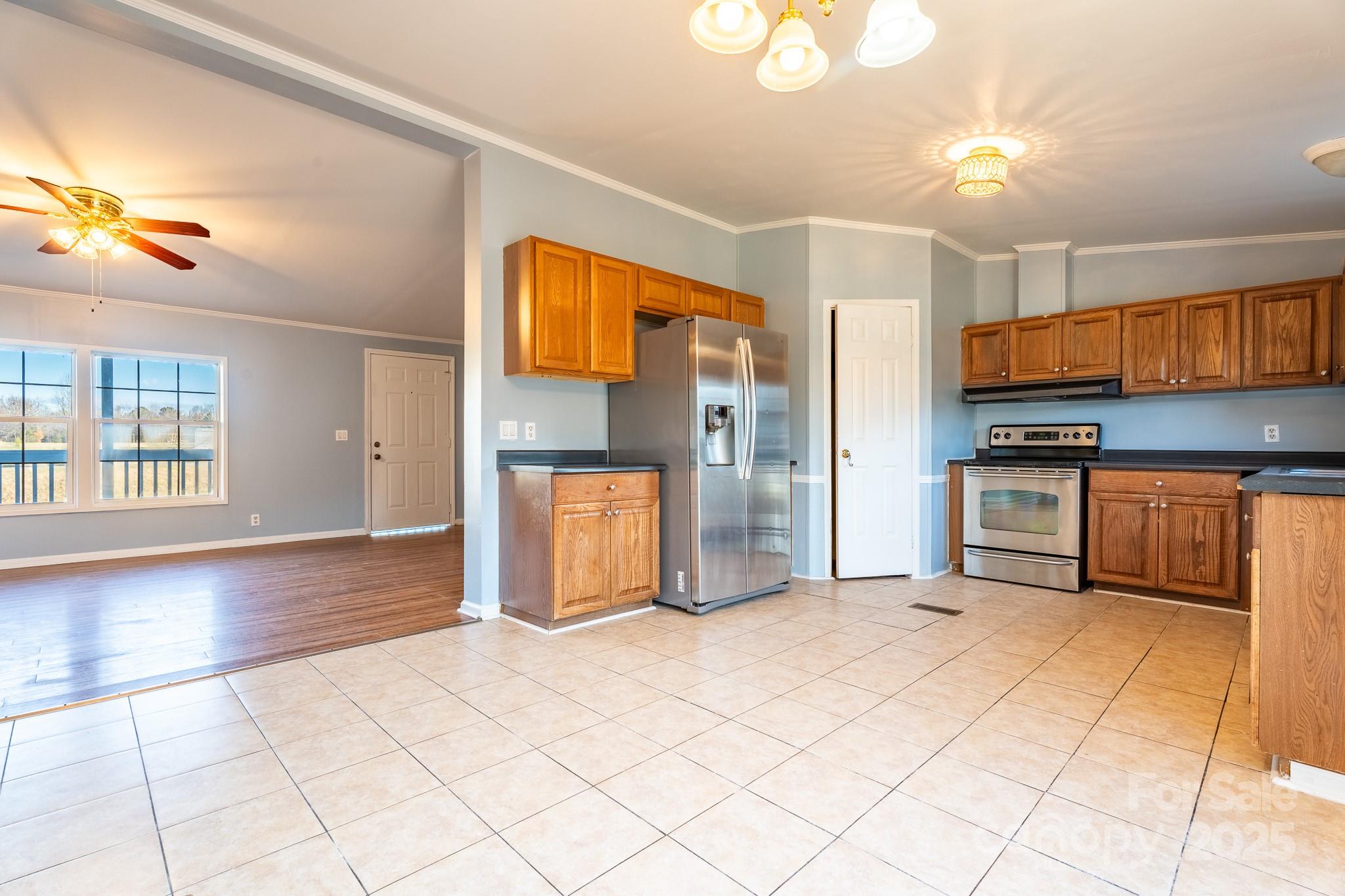 964 Lavender Road Grover, NC 28073 - Photo 4 of 26 a view of a kitchen with a sink and cabinets