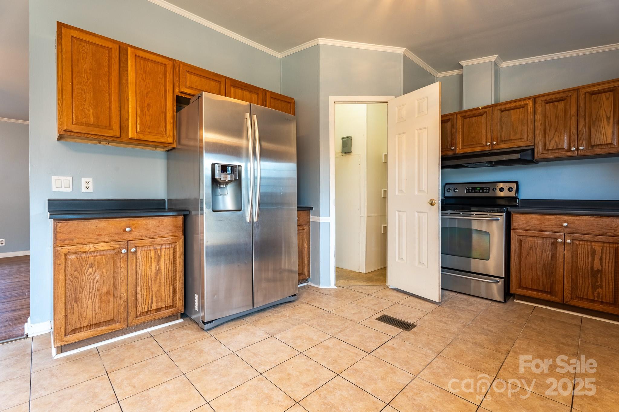 964 Lavender Road Grover, NC 28073 - Photo 6 of 26 a view of a kitchen with stainless steel appliances granite countertop a refrigerator and a sink