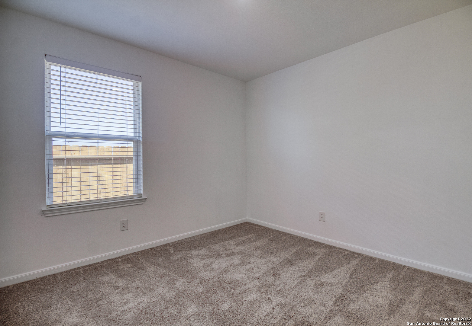 3055 Jackson Summit Converse, TX 78109 - Photo 21 of 31 an empty room with a window