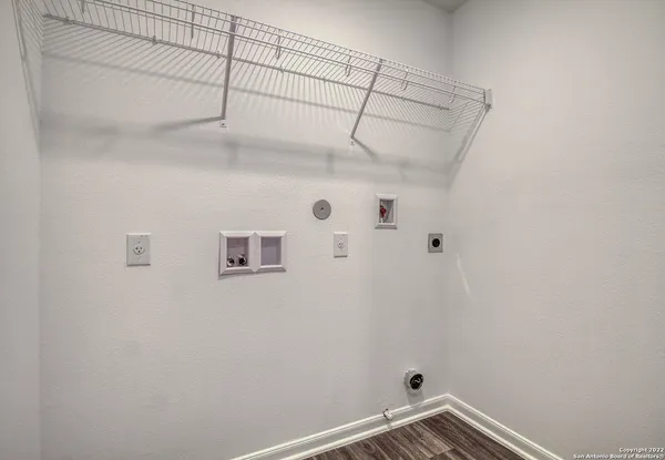a view of a room with racks on the wall