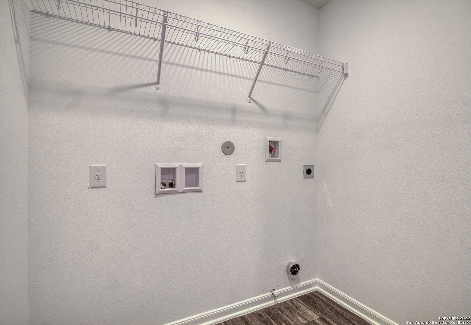 3055 Jackson Summit Converse, TX 78109 - Photo 23 of 31 a view of a room with racks on the wall