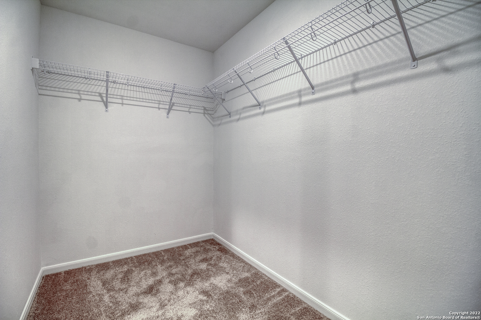 3055 Jackson Summit Converse, TX 78109 - Photo 29 of 31 a view of a room with racks on the wall