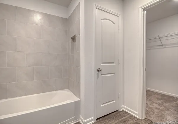 a bathroom with a bathtub