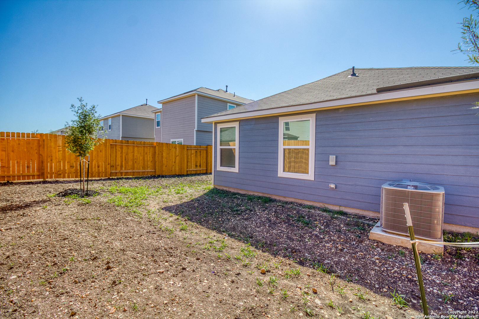 3055 Jackson Summit Converse, TX 78109 - Photo 3 of 31 a front view of a house with garden