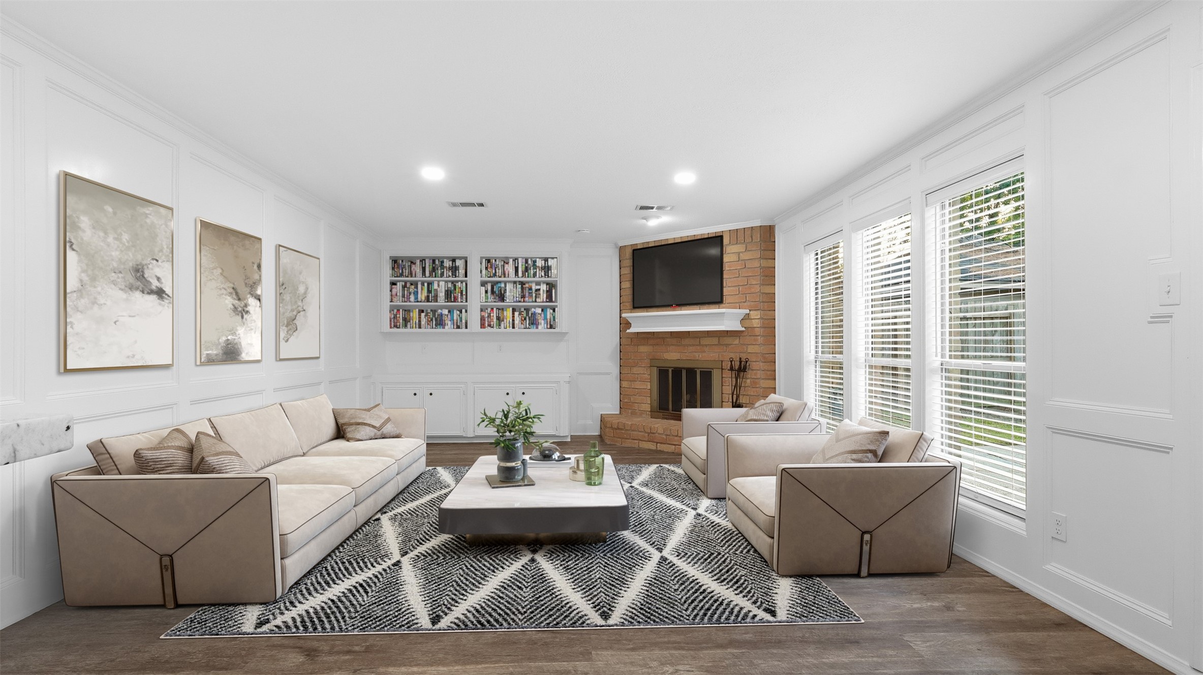 a living room with furniture a fireplace and a table