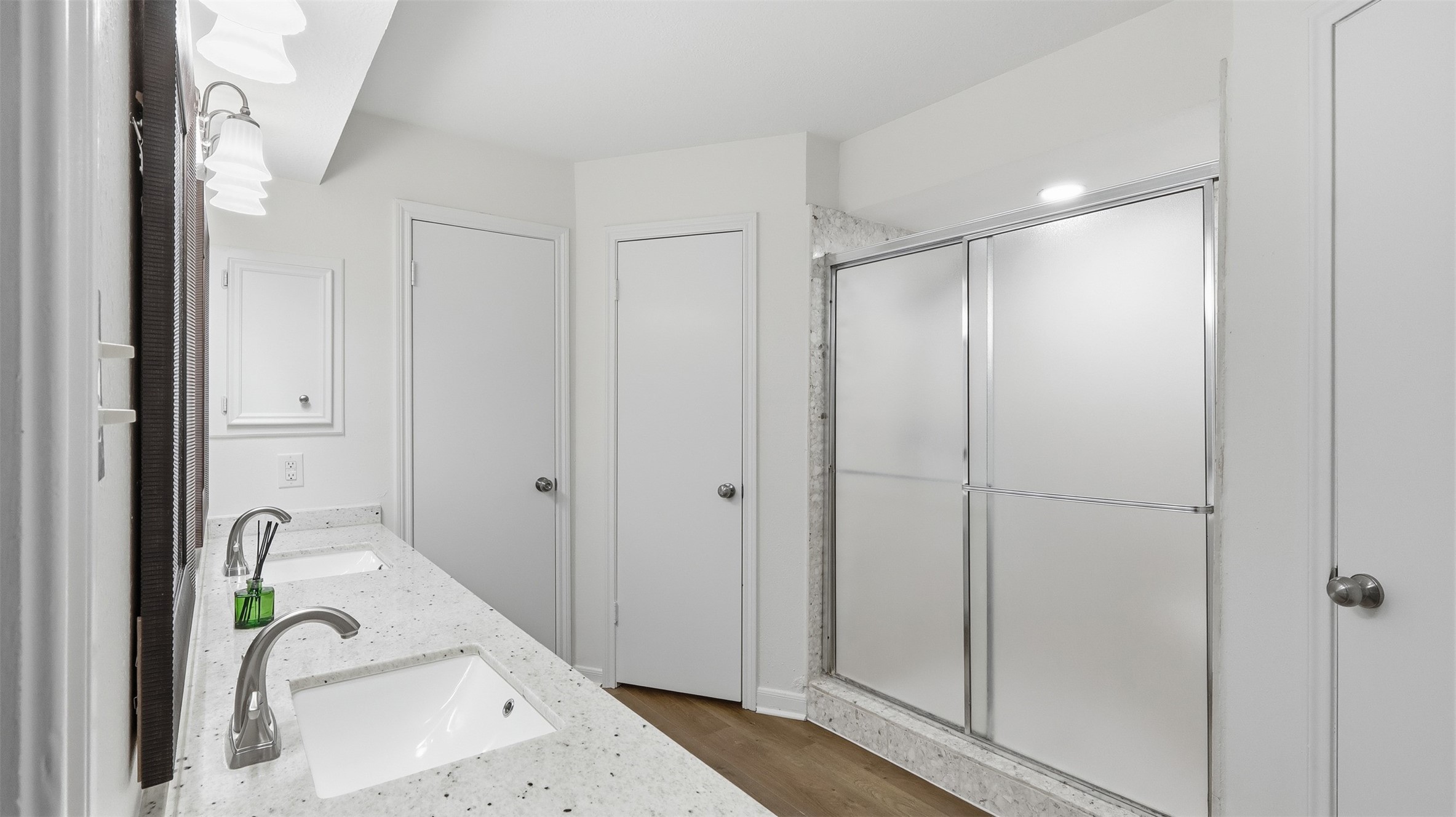 2715 Wild Ridge Drive Kingwood, TX 77339 - Photo 22 of 32 a bathroom with a bathtub and shower