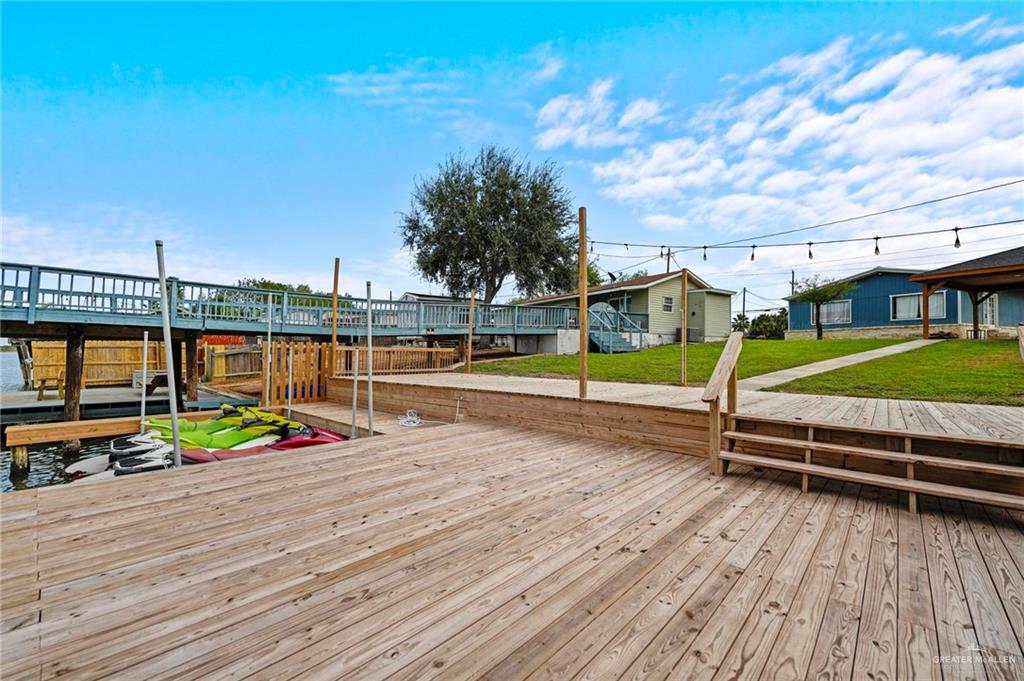 37443 Marshall Hutts Road Rio Hondo, TX 78583 - Photo 13 of 15 a view of swimming pool with seating space and hardwood floor