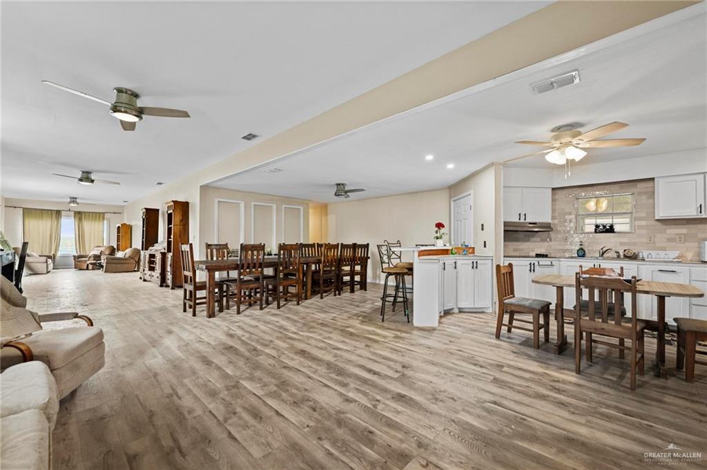 37443 Marshall Hutts Road Rio Hondo, TX 78583 - Photo 6 of 15 a living room with lots of furniture and white walls