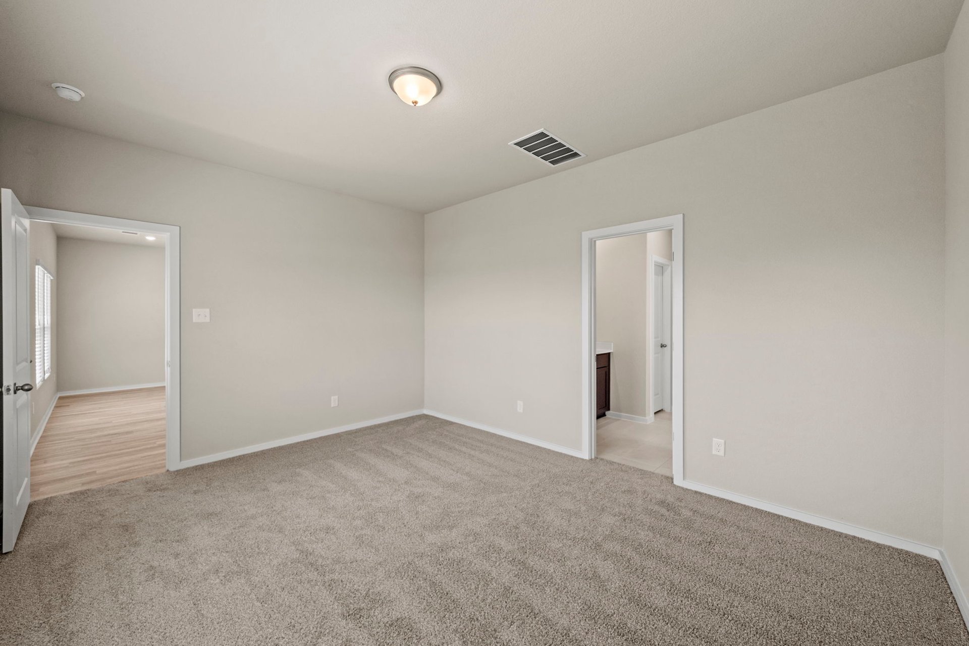 160 Wind Hill Jarrell, TX 76537 - Photo 20 of 27 Primary Bedroom