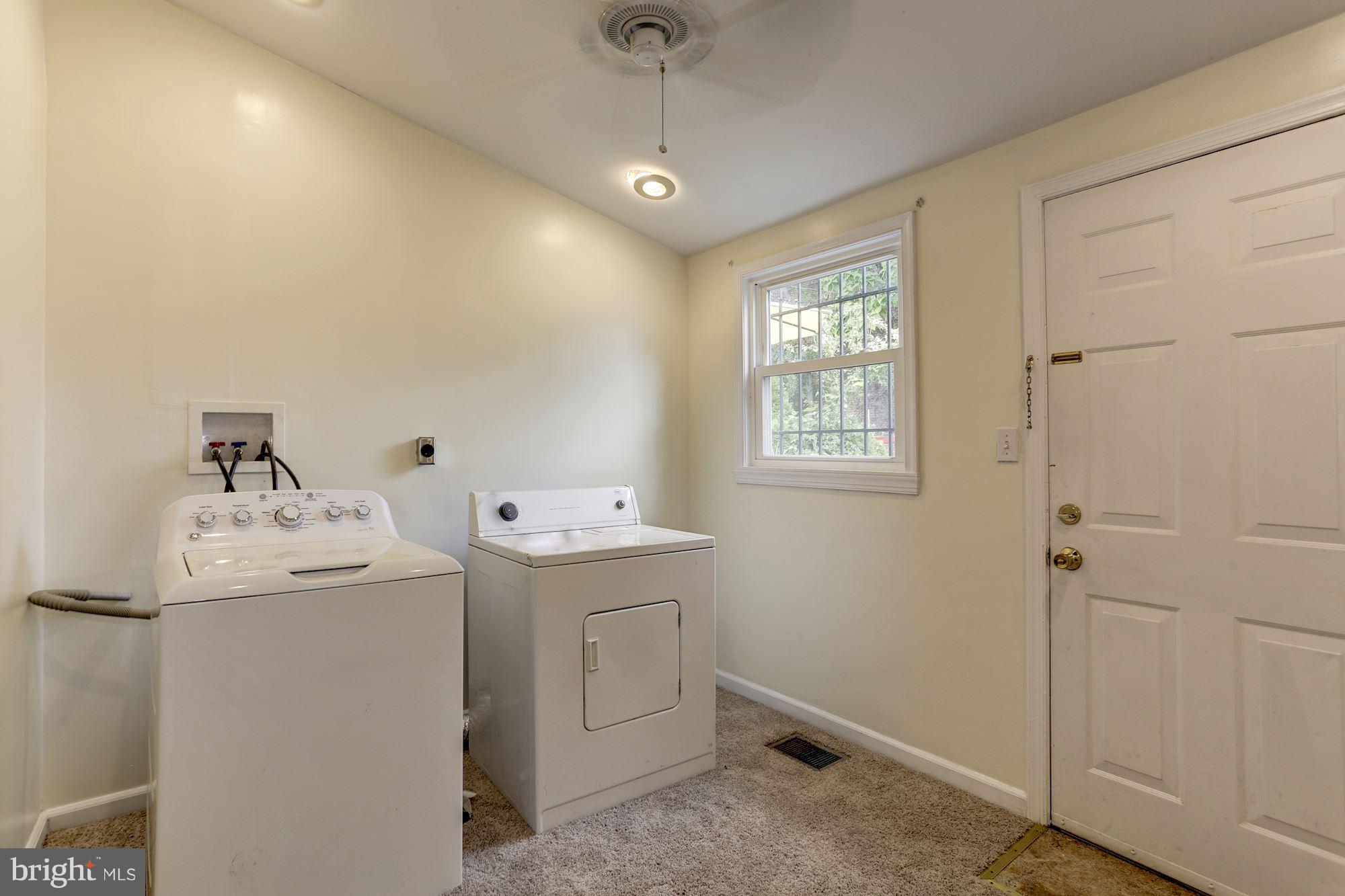 727 13th Street Northeast Washington, DC 20002 - Photo 14 of 27 a utility room with dryer and washer