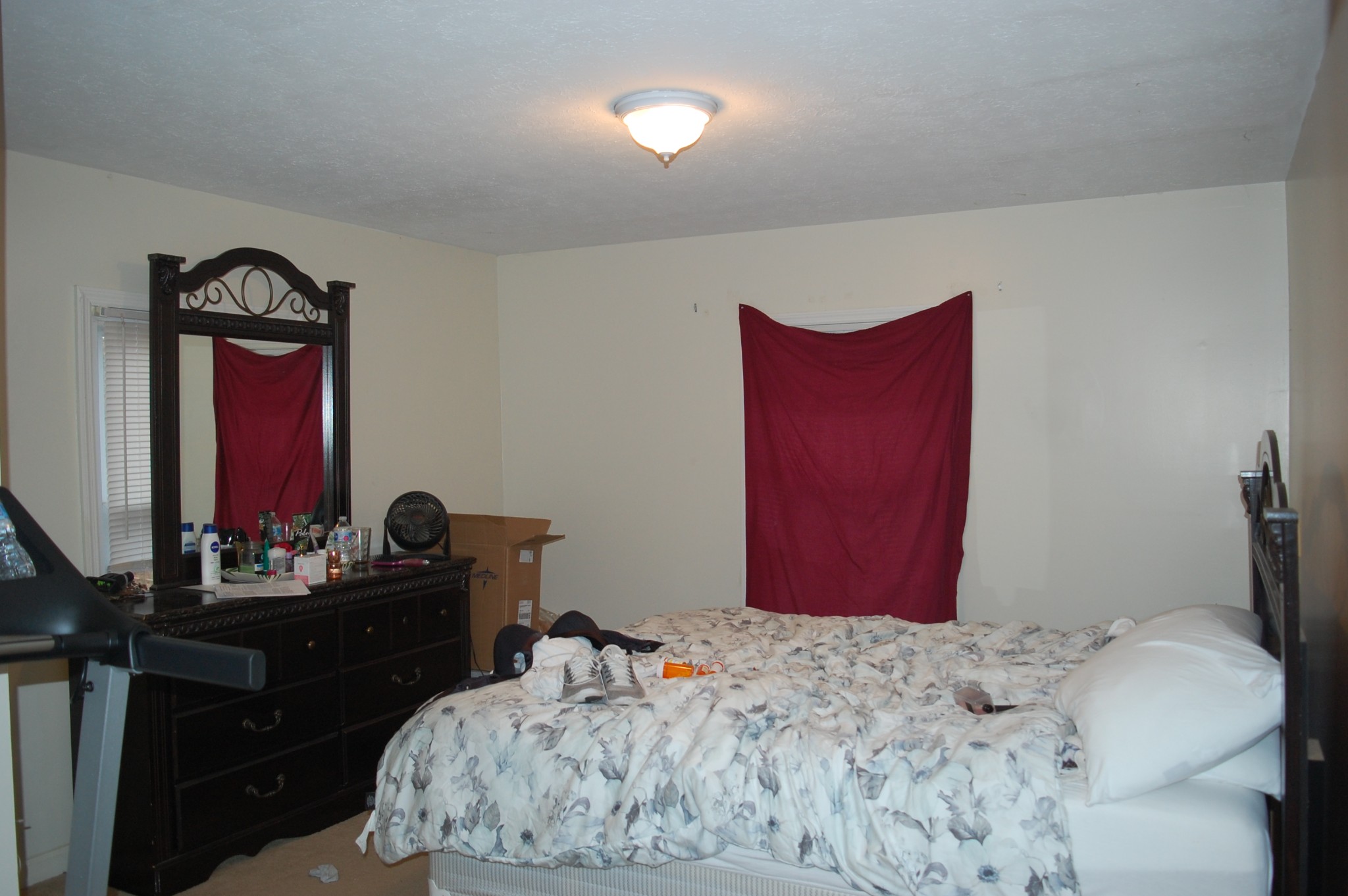 3301 Rossview Road Clarksville, TN 37043 - Photo 6 of 14 a bedroom with a bed and a dresser